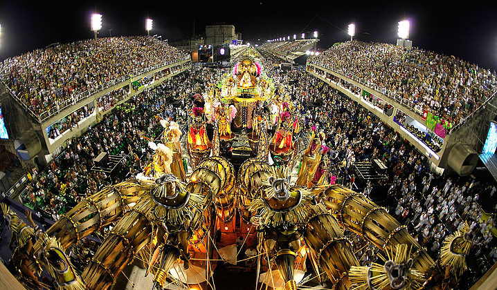 Revellers attend to XXXXXXXX Samba School parade during Rio de Janeiro's carnival on Marques de Sapucai Sambodromo.